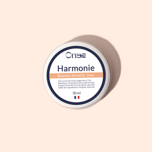 Pot de baume réparateur de jour Onaé Harmonie, soin naturel multi-usages pour peau sensible, formule concentrée à base d'actifs végétaux, packaging beige et bleu.