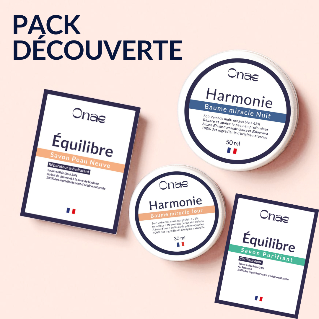 Ensemble de soins Onaé incluant savons Équilibre pour peaux neuves et purifiantes, ainsi que baumes Harmonie jour et nuit, formulés avec des ingrédients naturels pour réparer et hydrater la peau.